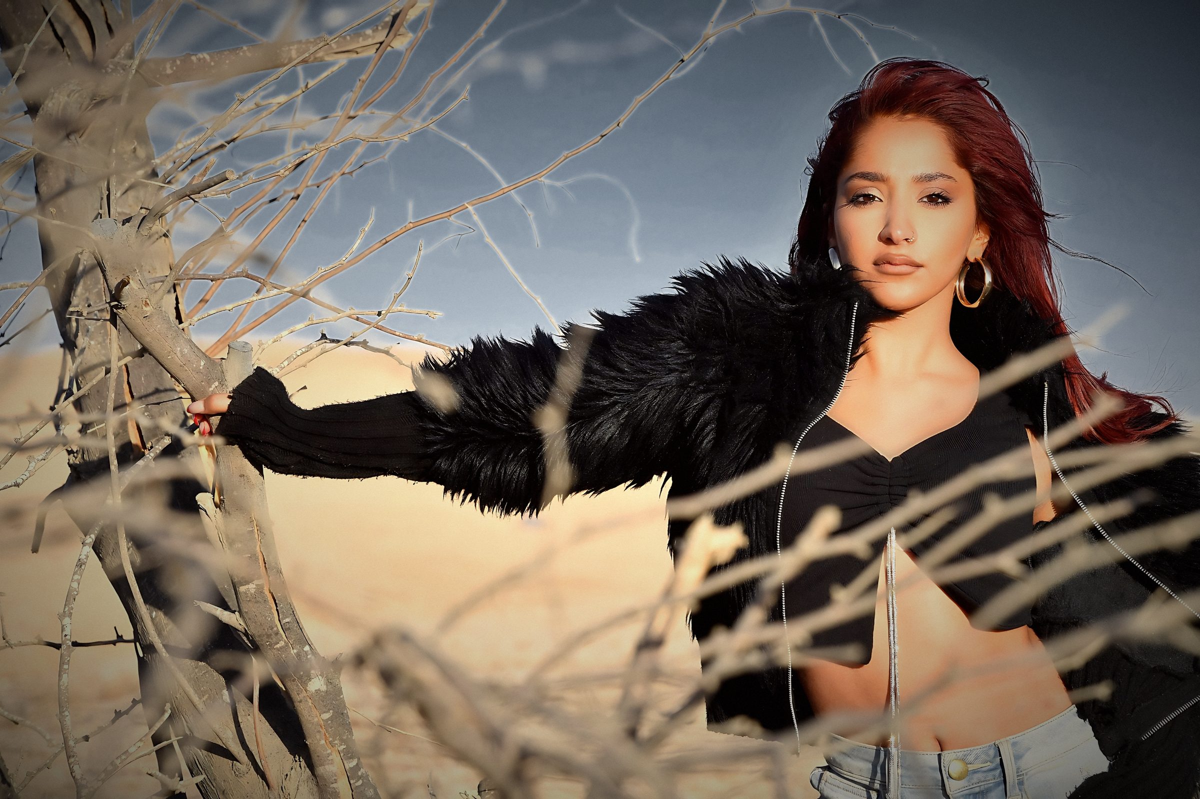 Daniel De Loco in the desert, black fur jacket