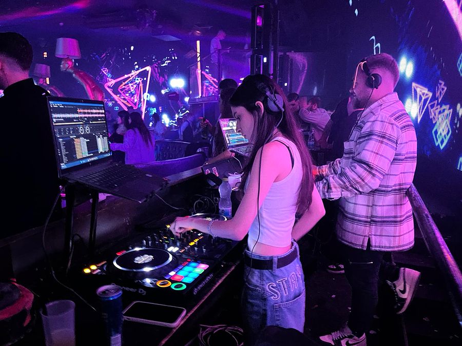 DJ Jaqueline at the club decks